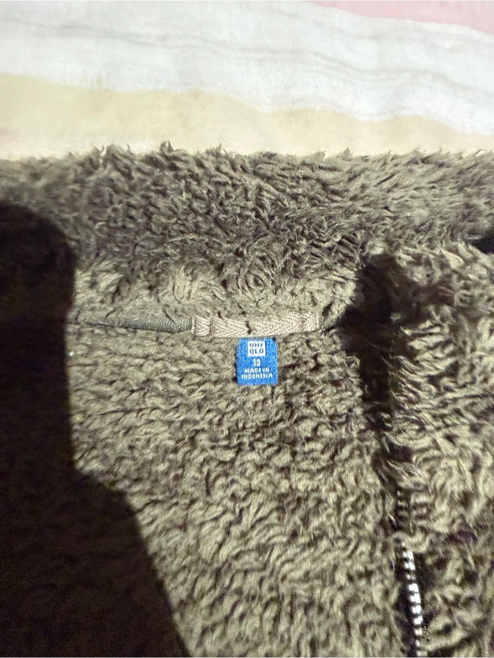 Uniqlo fluffy fleece jacket, size 13 years